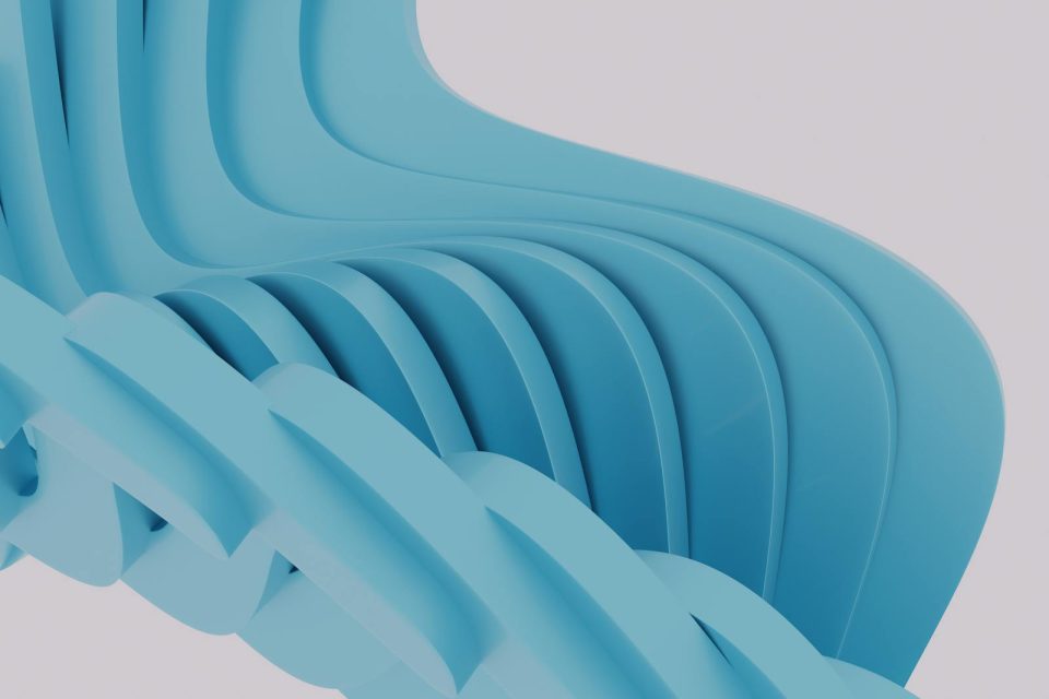 A sleek and smooth abstract design showcasing blue geometric forms in a 3D render.